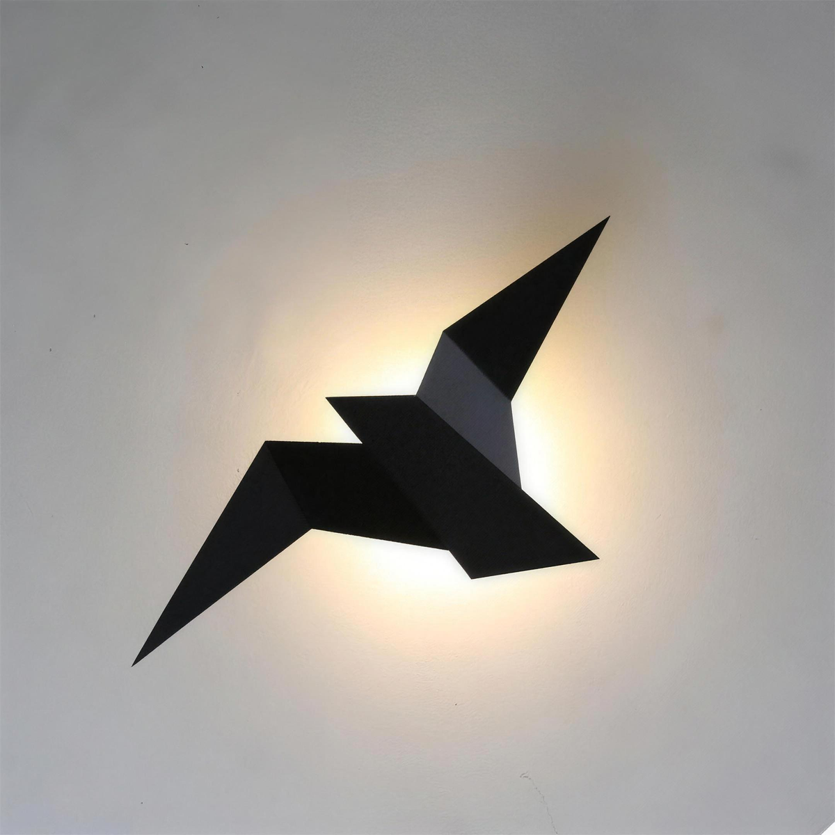 Oiseau LED noir allumé halo chaleureux 2K